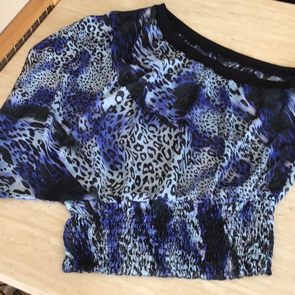 Leopard print shirt.